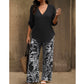 ✨🛍️Fresh Drop -  Matching Set with V-Neck Top – Vibrant Print & Relaxed Fit for Any Casual Occasion