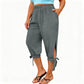 👖🌿 Relaxed capri pants with an elastic waistband, side ties, and pockets