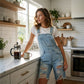 Women's Distressed Denim Overall Shorts